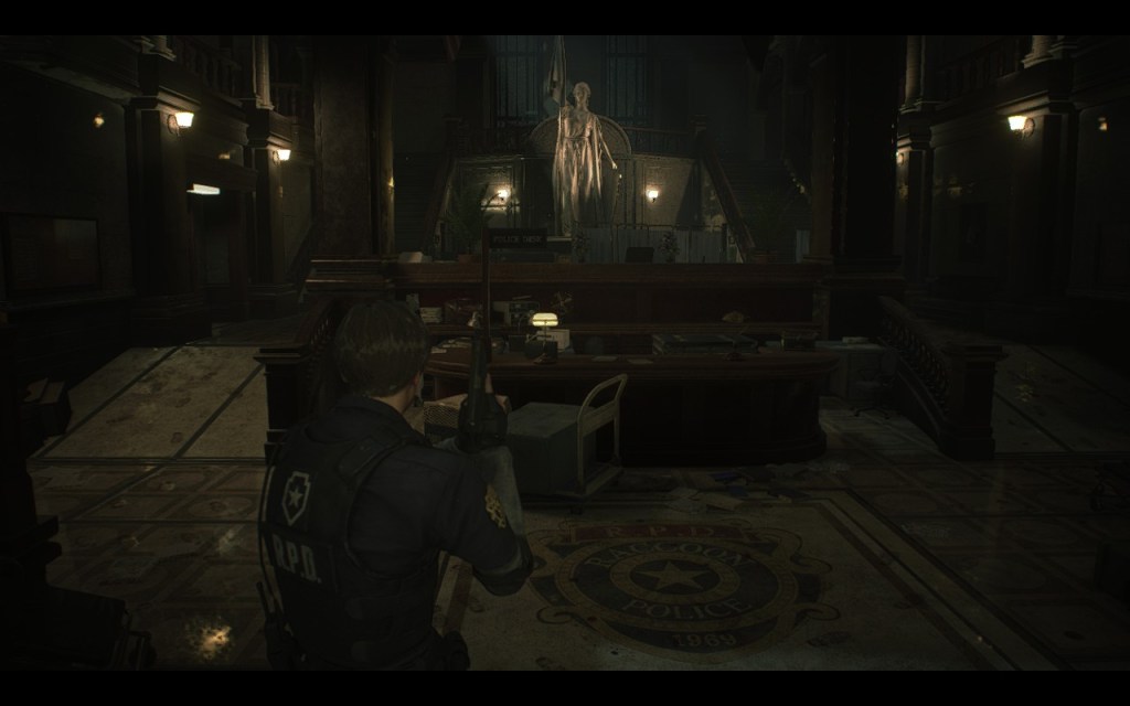 Resident Evil 2 Remake, Leon Kennedy standing at the main entrance of the Racoon City Police Station