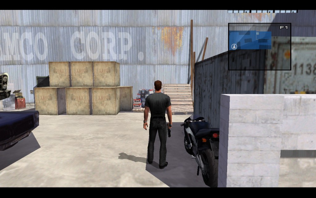 Jack Wade arriving at a mission at a mechanic shed.